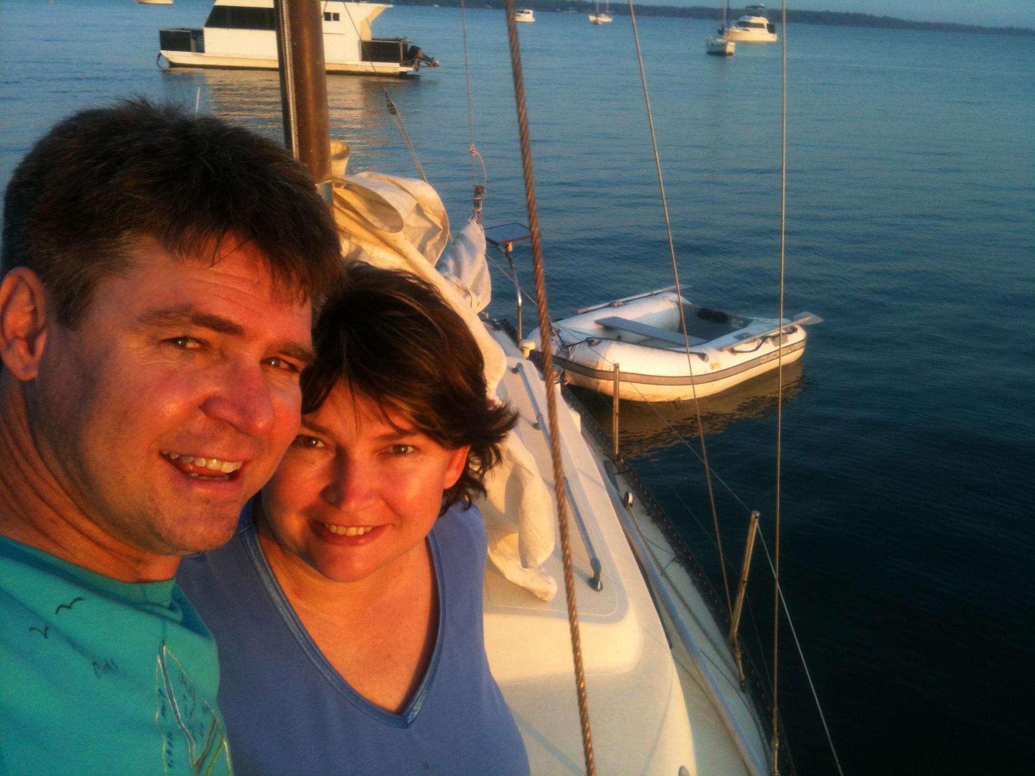 Jim and Jayne aboard their boat, anchored off Coochiemudlo Island in 2012